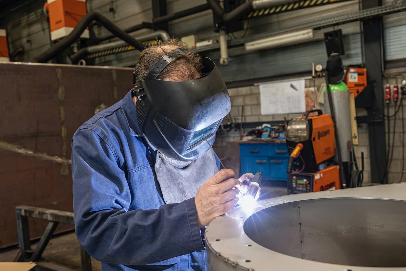 A welder at work in a modern workshop